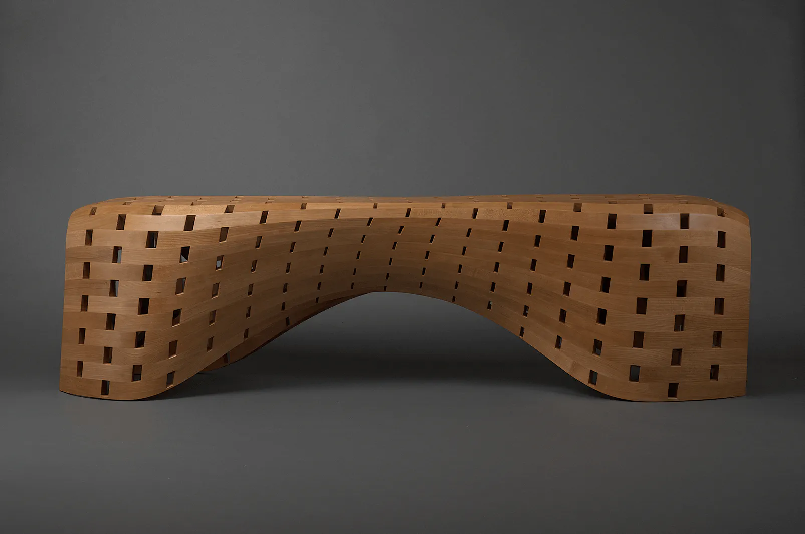 The Peanut Bench, a coopered wooden bench made with Rhino